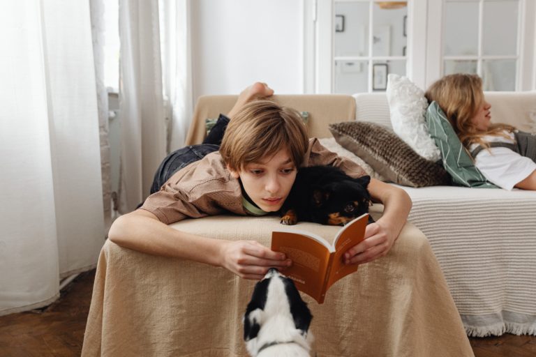 kids enjoying their time on couch in vacation rental home